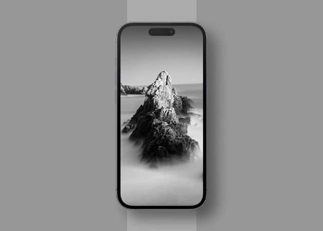 Mountain peak in a dark setting iPhone wallpaper